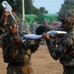 Indian Soldiers Taking a Soldier to Hospital