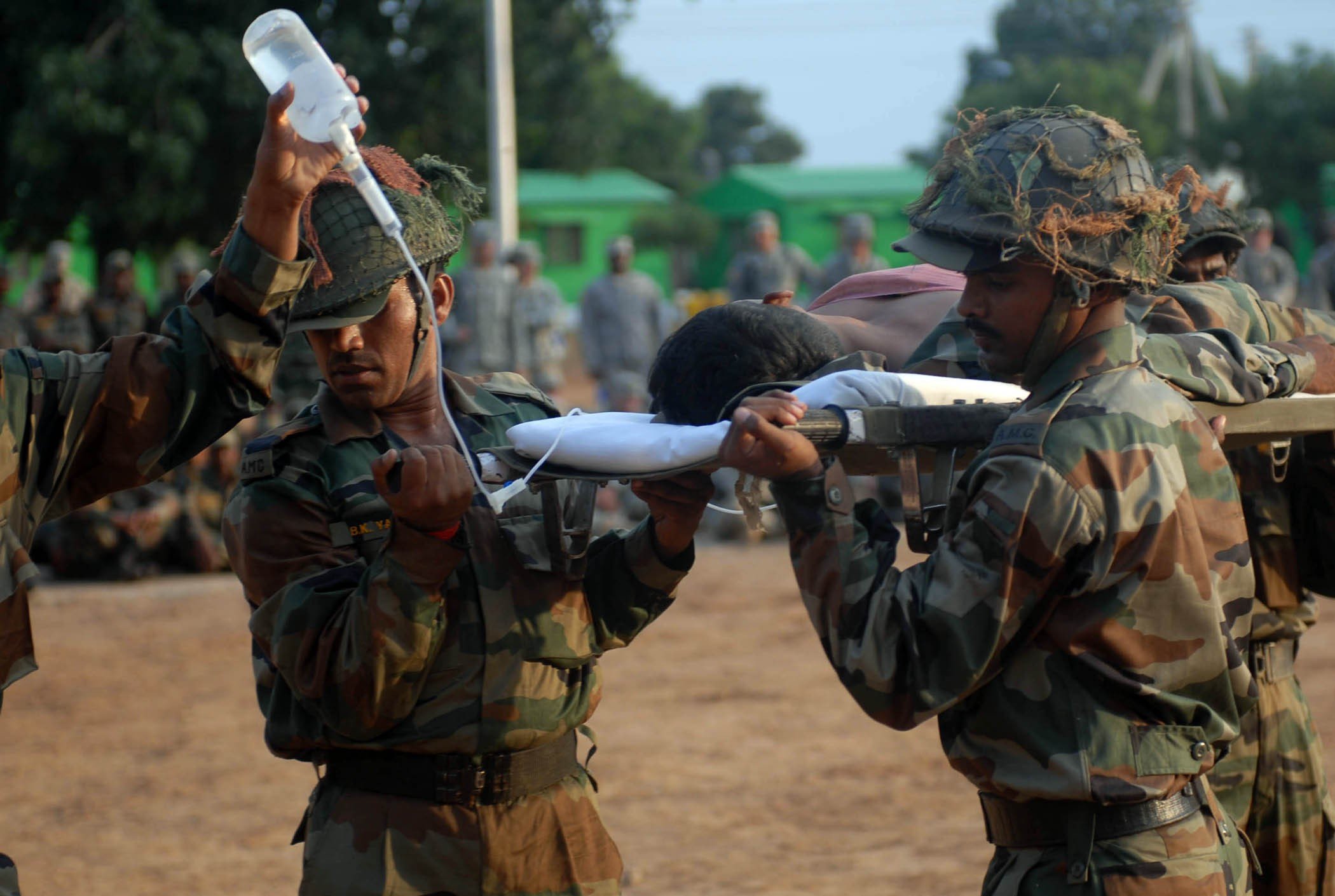 Indian Soldiers Taking a Soldier to Hospital