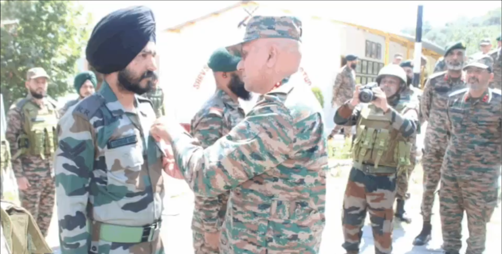 Lt Gen Pratik Sharma Commending a Soldier