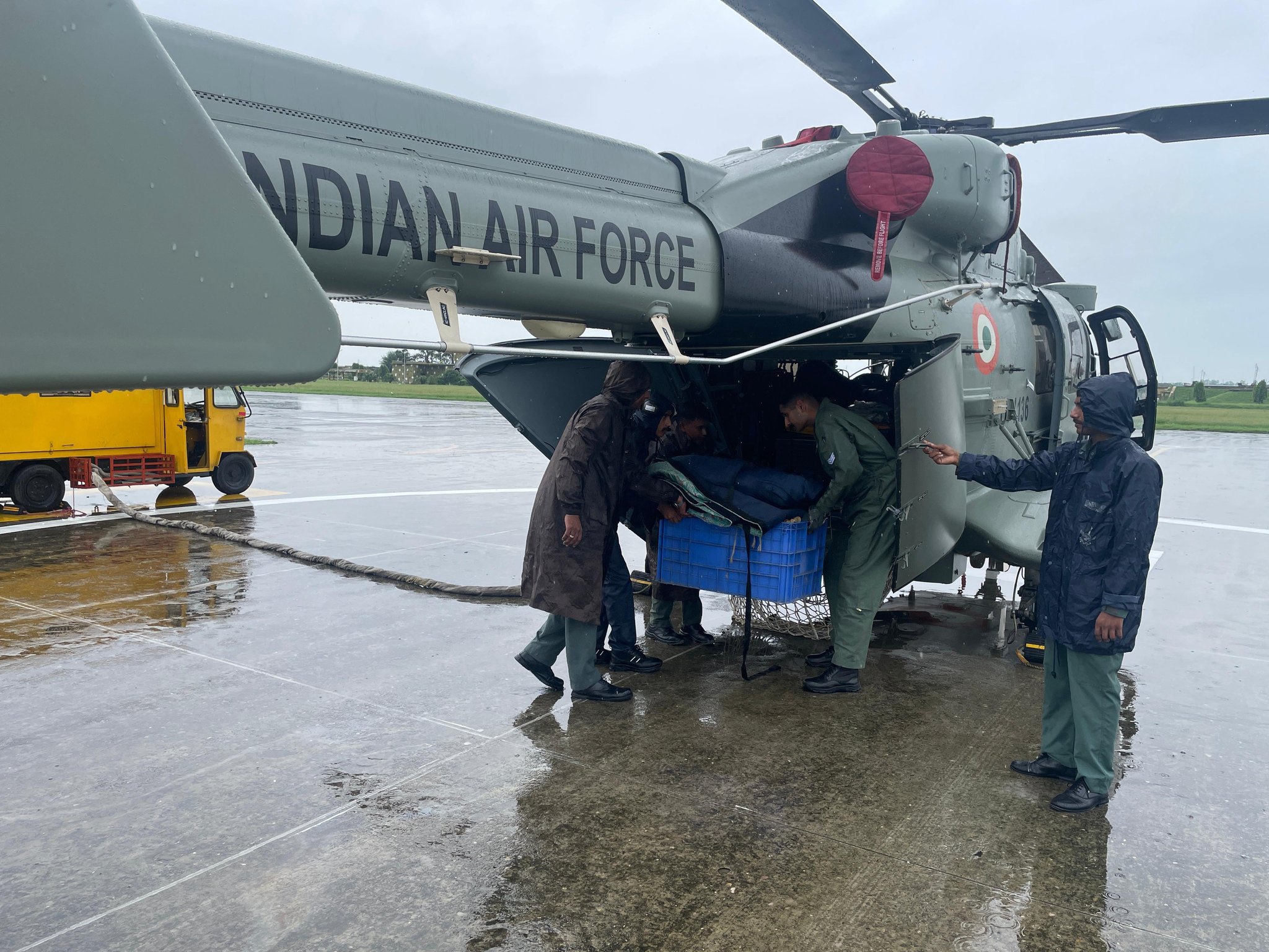 Soldiers Putting Aid in ALH Dhruv