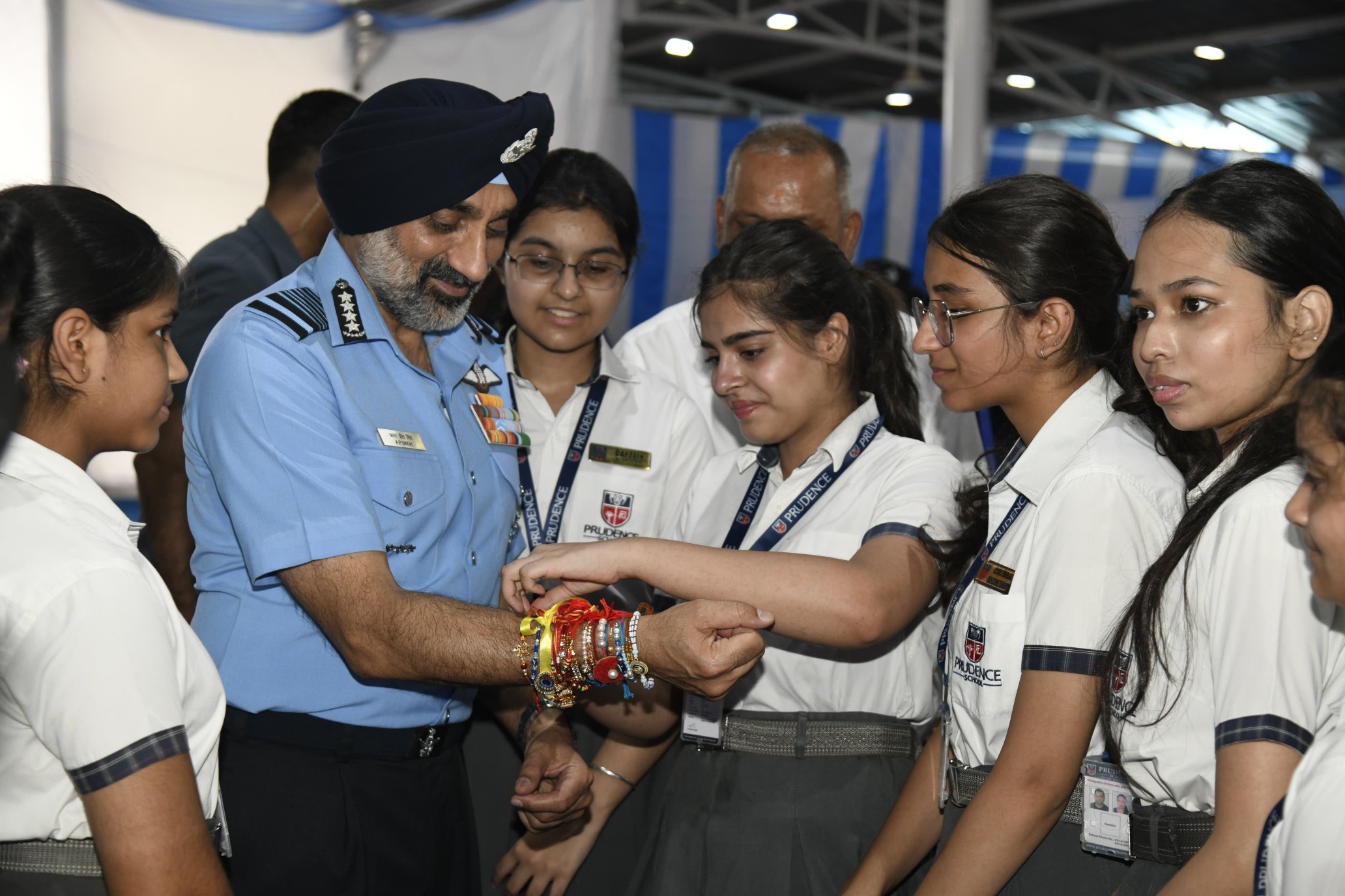 Students Tie Rakhi to Air Force Chief