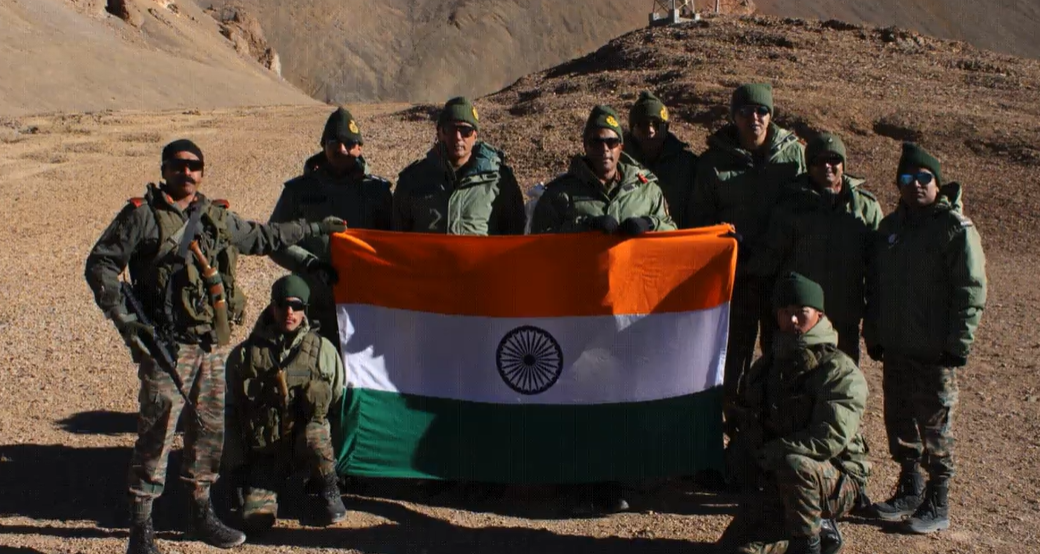 Lt Gen Pratik Sharma with Others Holding the Indian Flag