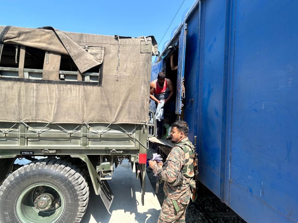 Things Getting Loaded into Trucks