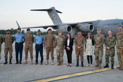 US Aircraft Along with Soldiers