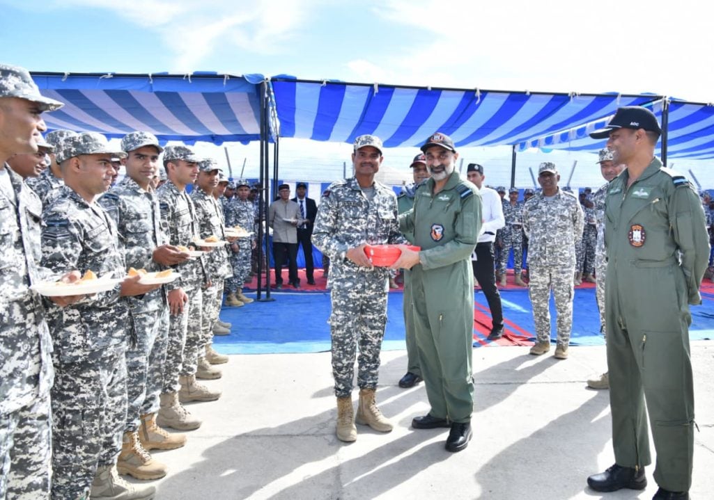 Air Chief Marshal AP Singh Giving Sweets to Soldiers