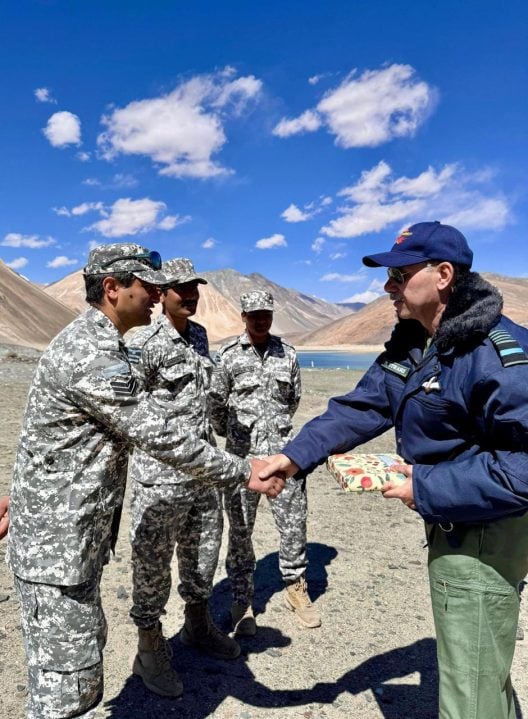 Air Marshal Tiwari Giving Sweets to Soldiers