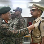 Gen Upendra Dwivedi Commending a Police Officer