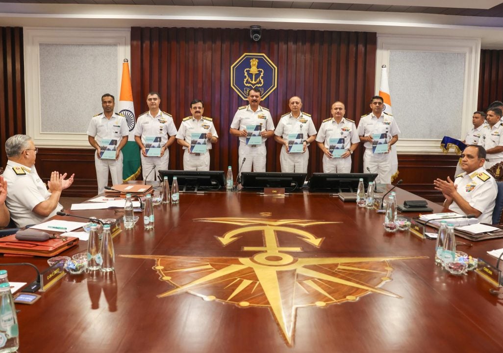 Navy Officers with Book