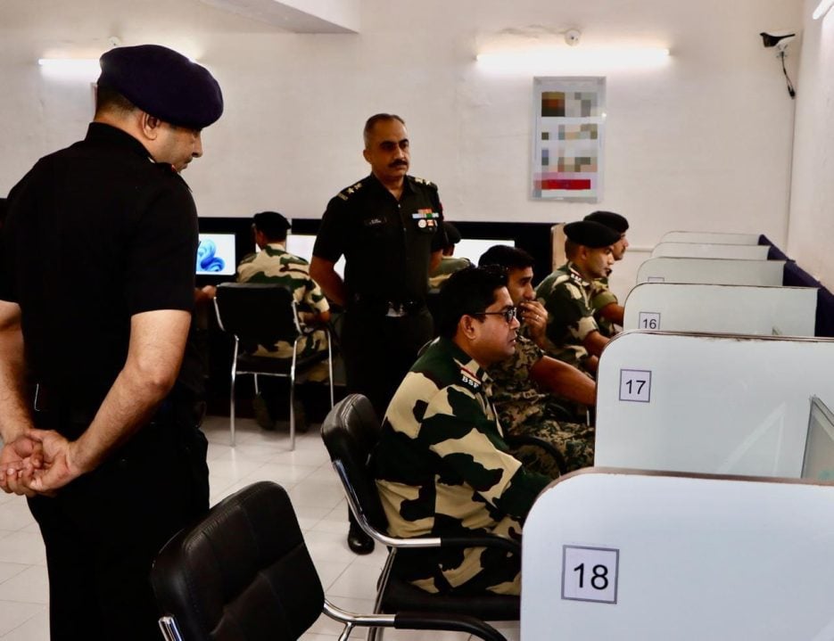 Officer Checking Soldier Using Computer