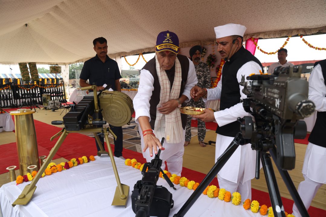 Rajnath Singh Putting Tikka on A Weapon