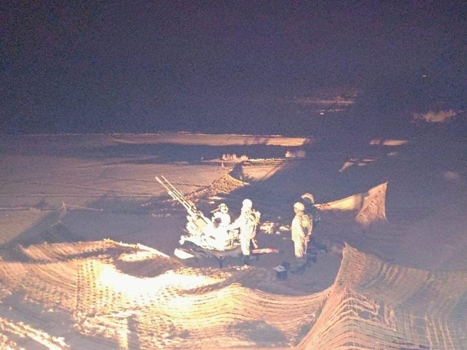 Soldiers Using Artillery