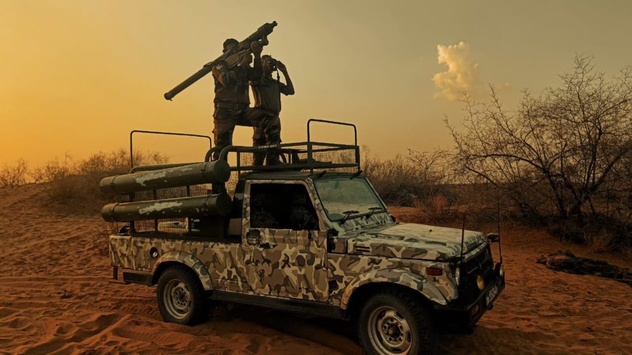 Soldiers on Jeep
