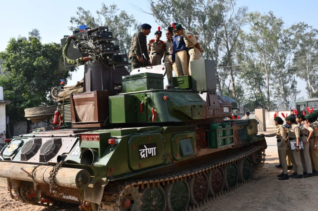 Cadets Reviewing Tanks