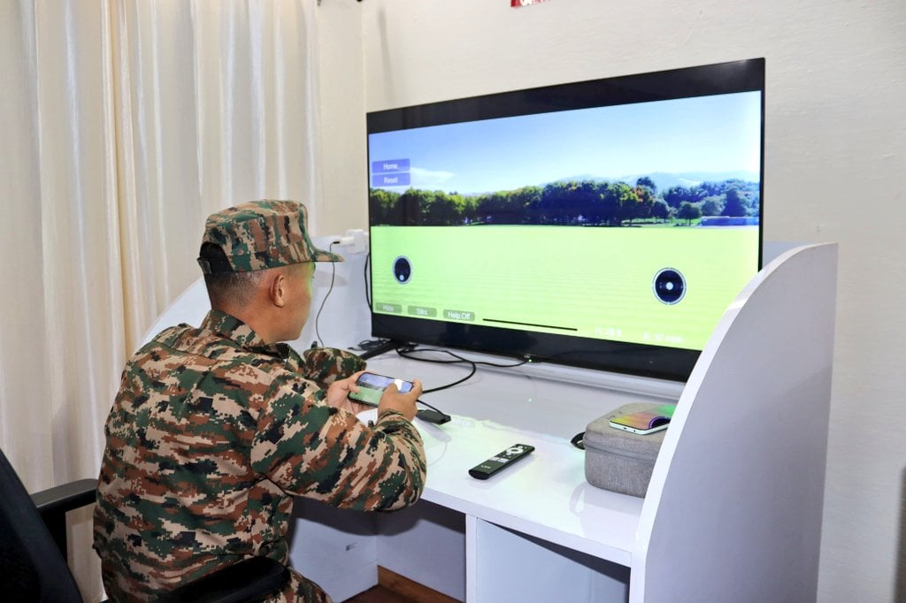 IMA Student Using Stimulator