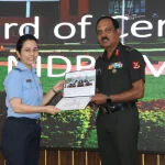 Officer Awarding Female Officer
