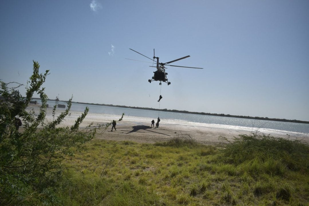 Soldiers Landing From Helicopter