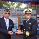 Officer Giving Award