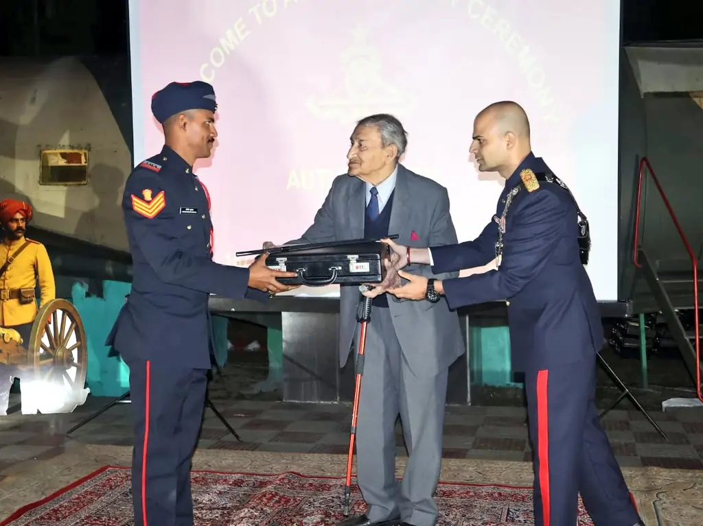 Officer Giving Award to Cadet