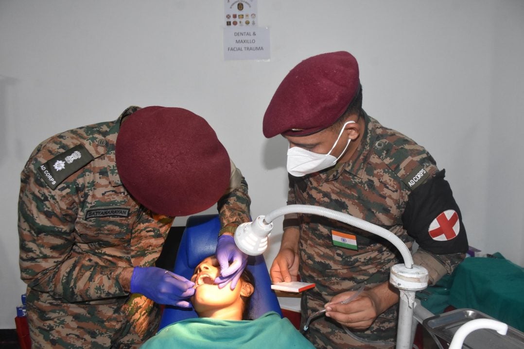 Officers Doing Dental Checkup