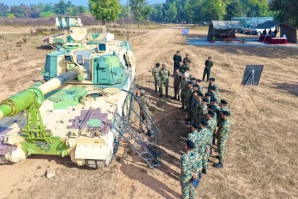 Officers Reviewing Tank