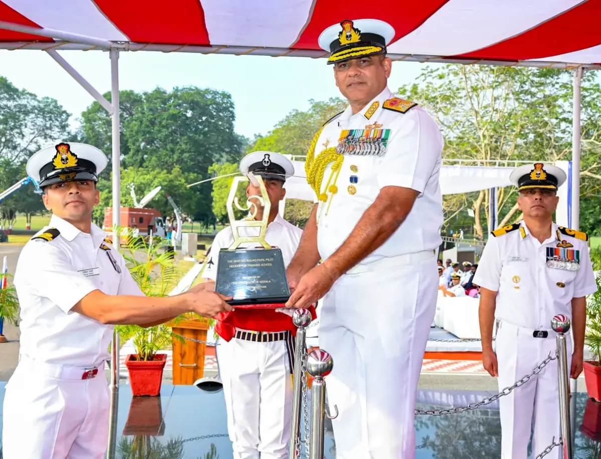 Vice Admiral Bhalla Giving Trophy