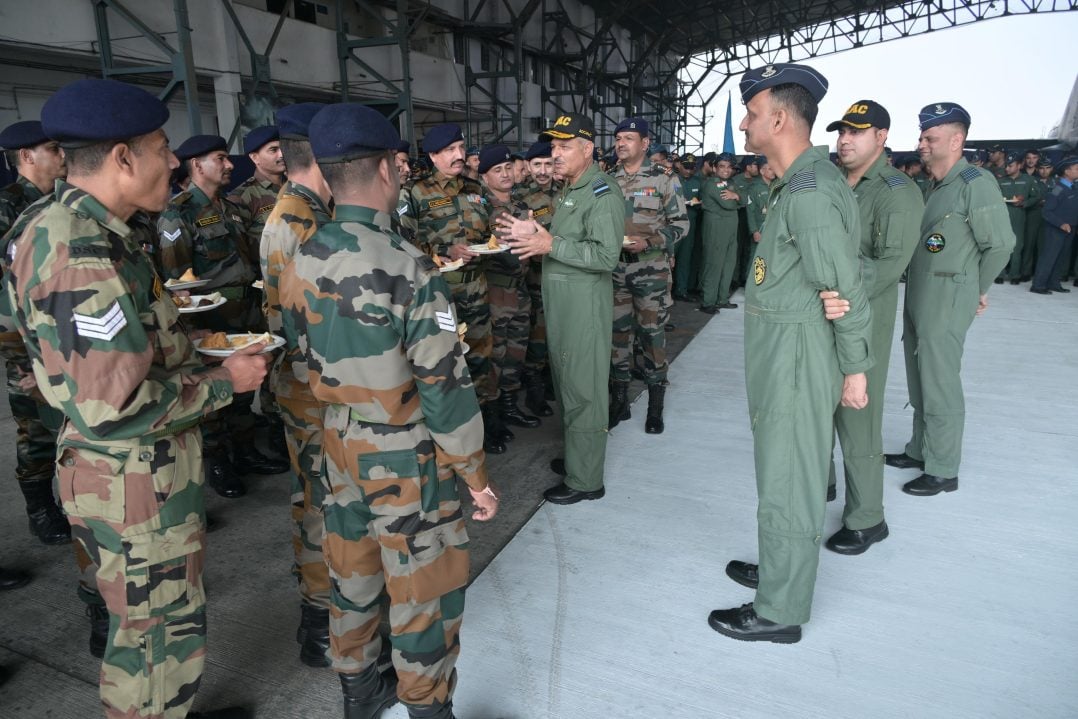 Air Marshal Surat Singh Discussing