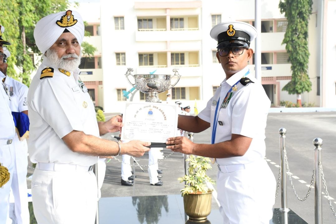 Officer Giving Certificate