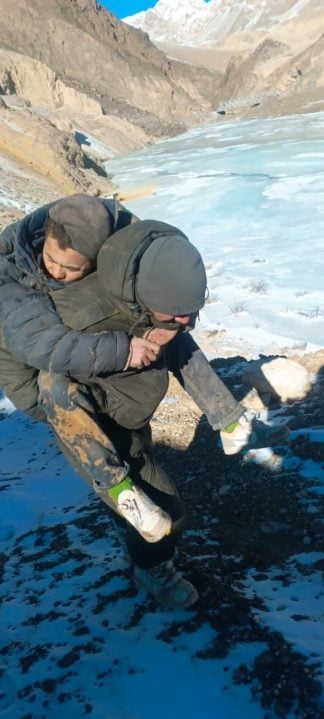 Soldier Rescuing Civilian