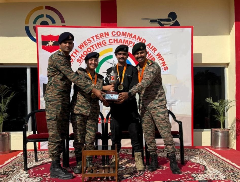 Officers Lifting Trophy