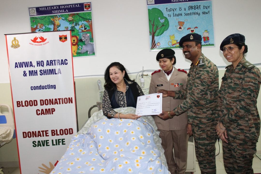 Officers Giving Certificate