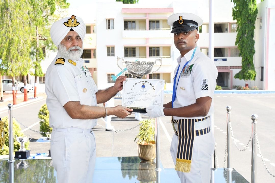 Officer Giving Award and Certificate