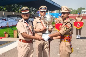 Officer Giving Trophy