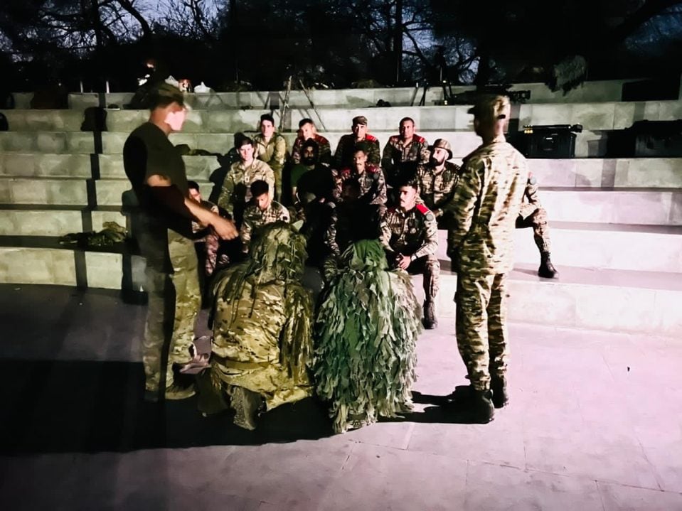 Officers Discussing 12