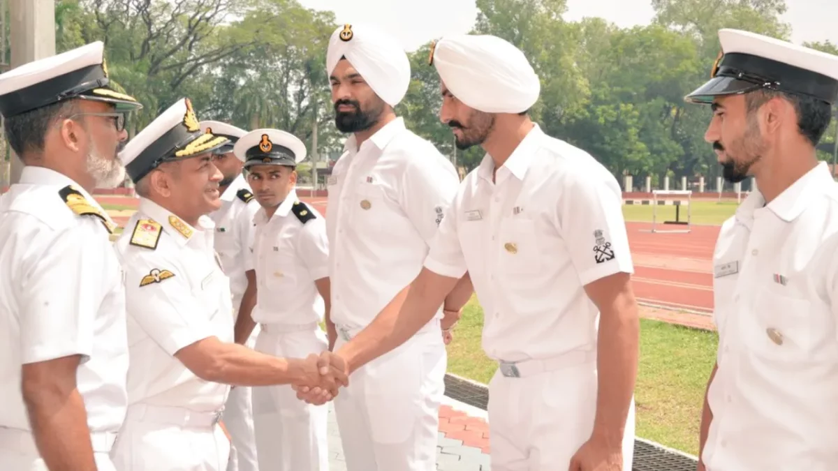 Vice Adm C R Praveen Nair Shaking Hands