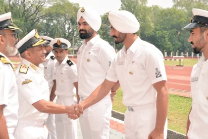 Vice Adm C R Praveen Nair Shaking Hands