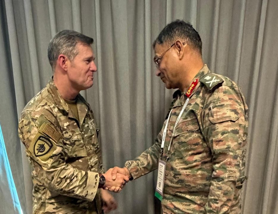 Lieutenant General Pushpendra Pal Singh Shaking Hands