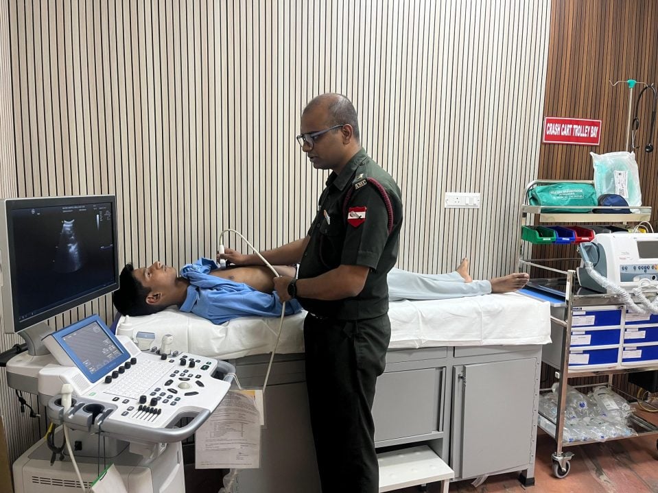 Officer Checking Patient