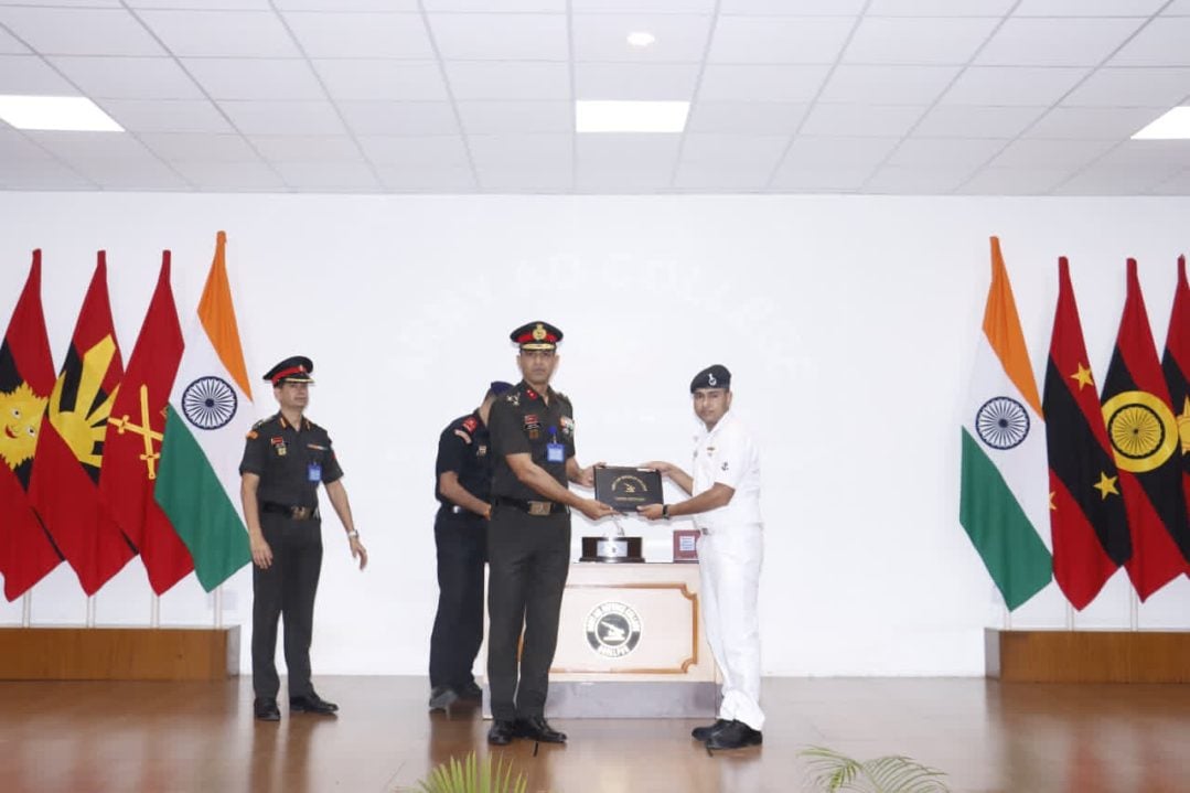 Officer Giving Award at AD College
