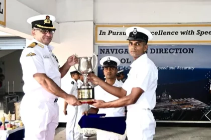Officer Giving Trophy