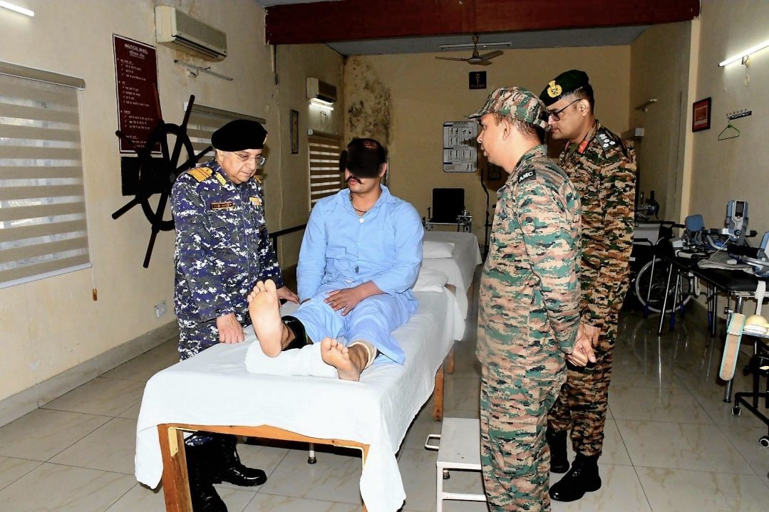 Surg VAdm Vivek Hande with Patient