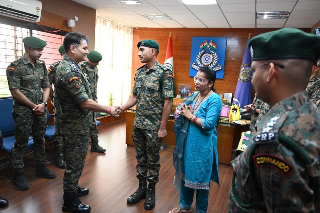 ASI Amrit Kumar Shaking Hands