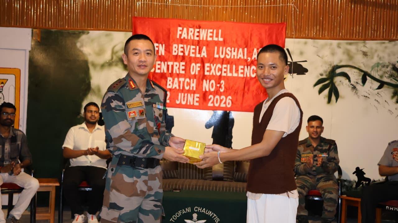 Officer Giving Award to Awardee
