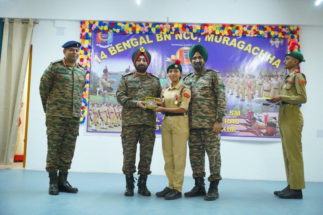 Officer Giving Award to NCC Cadet