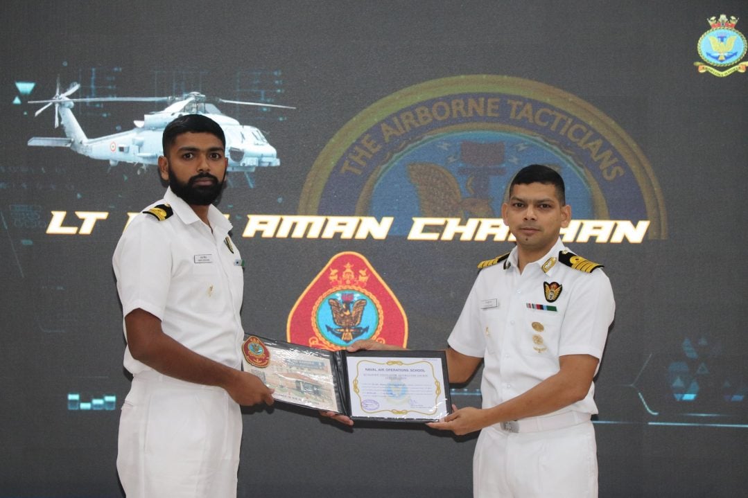 Officer Giving Certificate