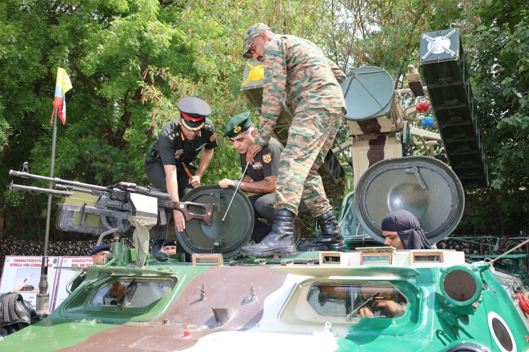 Officer Reviewing Tank