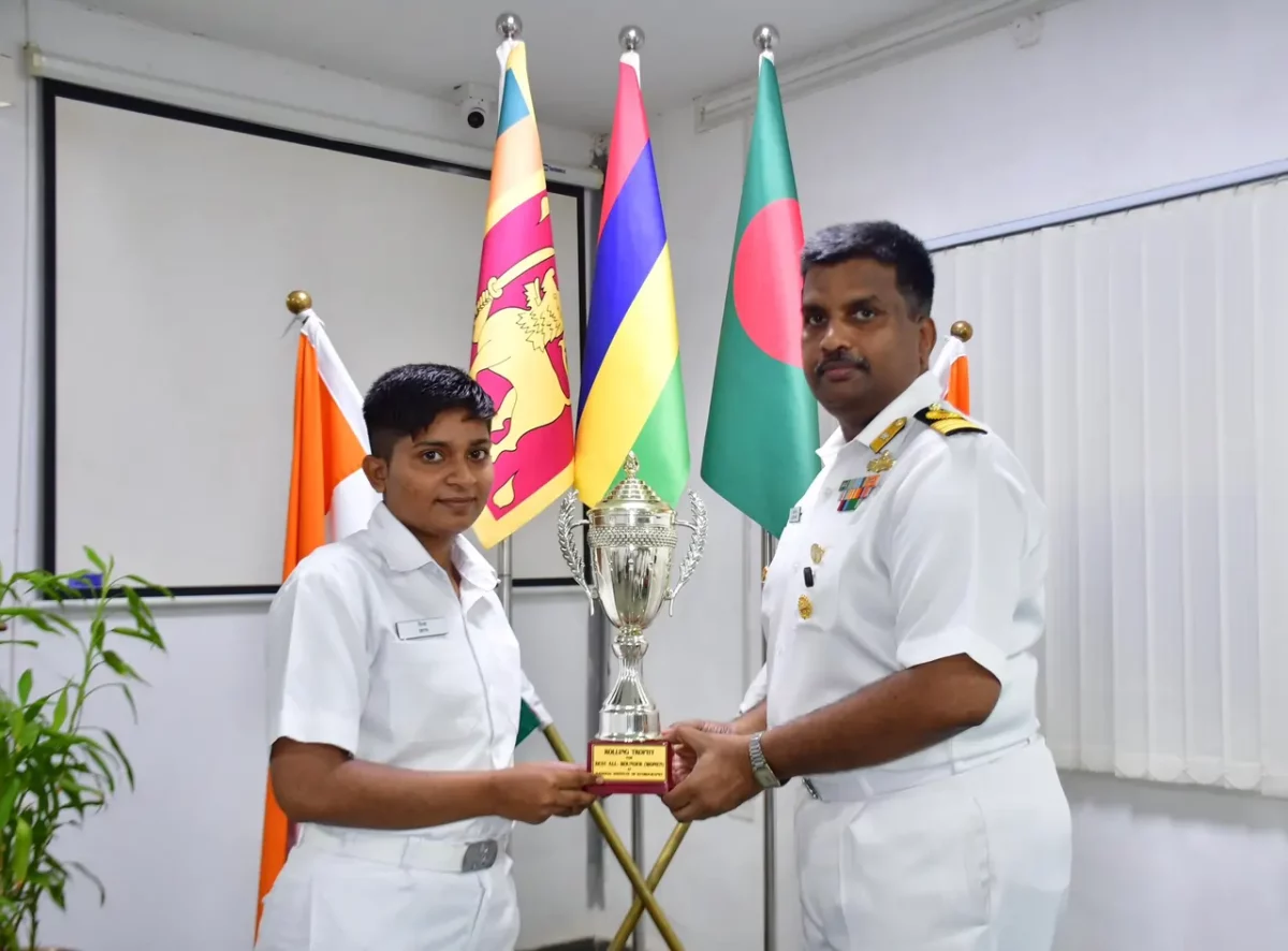 Trophy Being Given by Officers