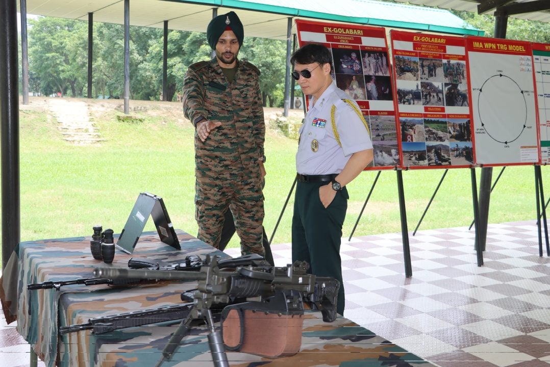 Lt Col Han Jonghun Reviewing Guns