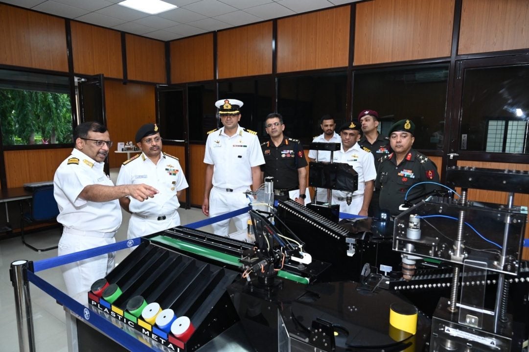 R Adm Chandegave Reviewing