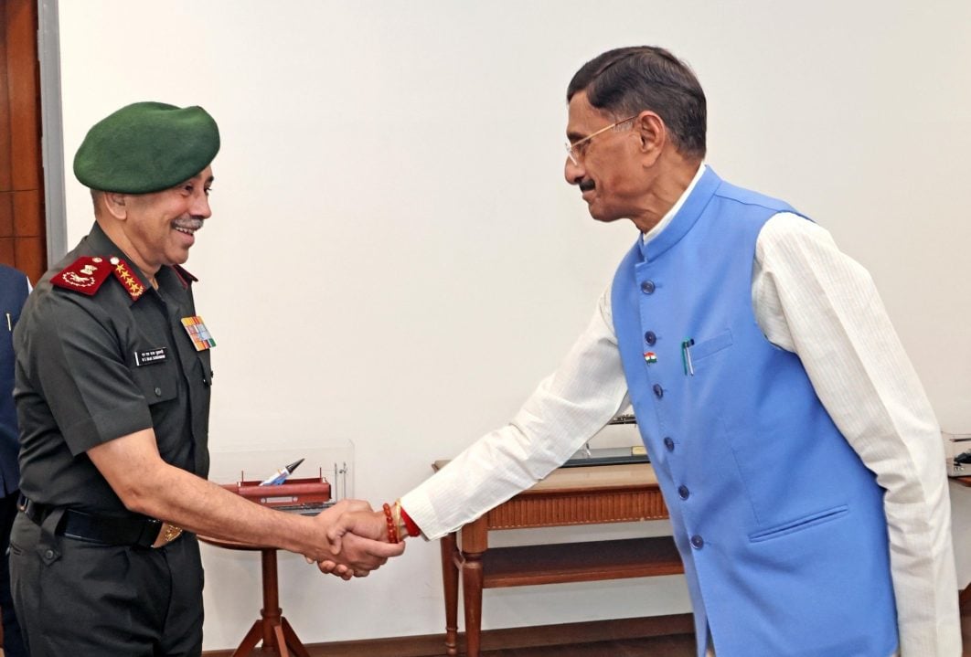 Sanjay Seth Shaking Hands