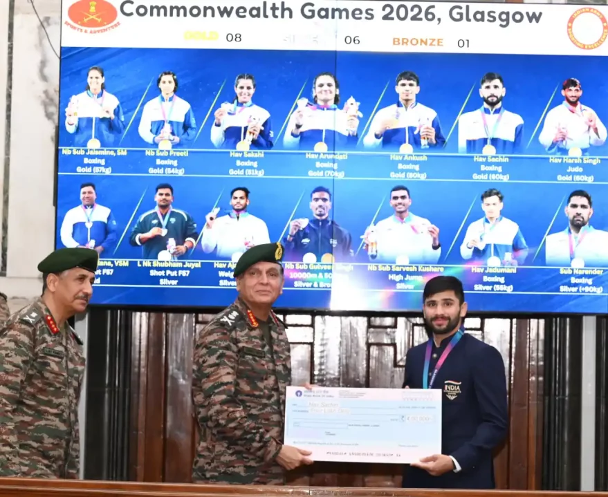 General Dhiraj Seth Giving Cheque